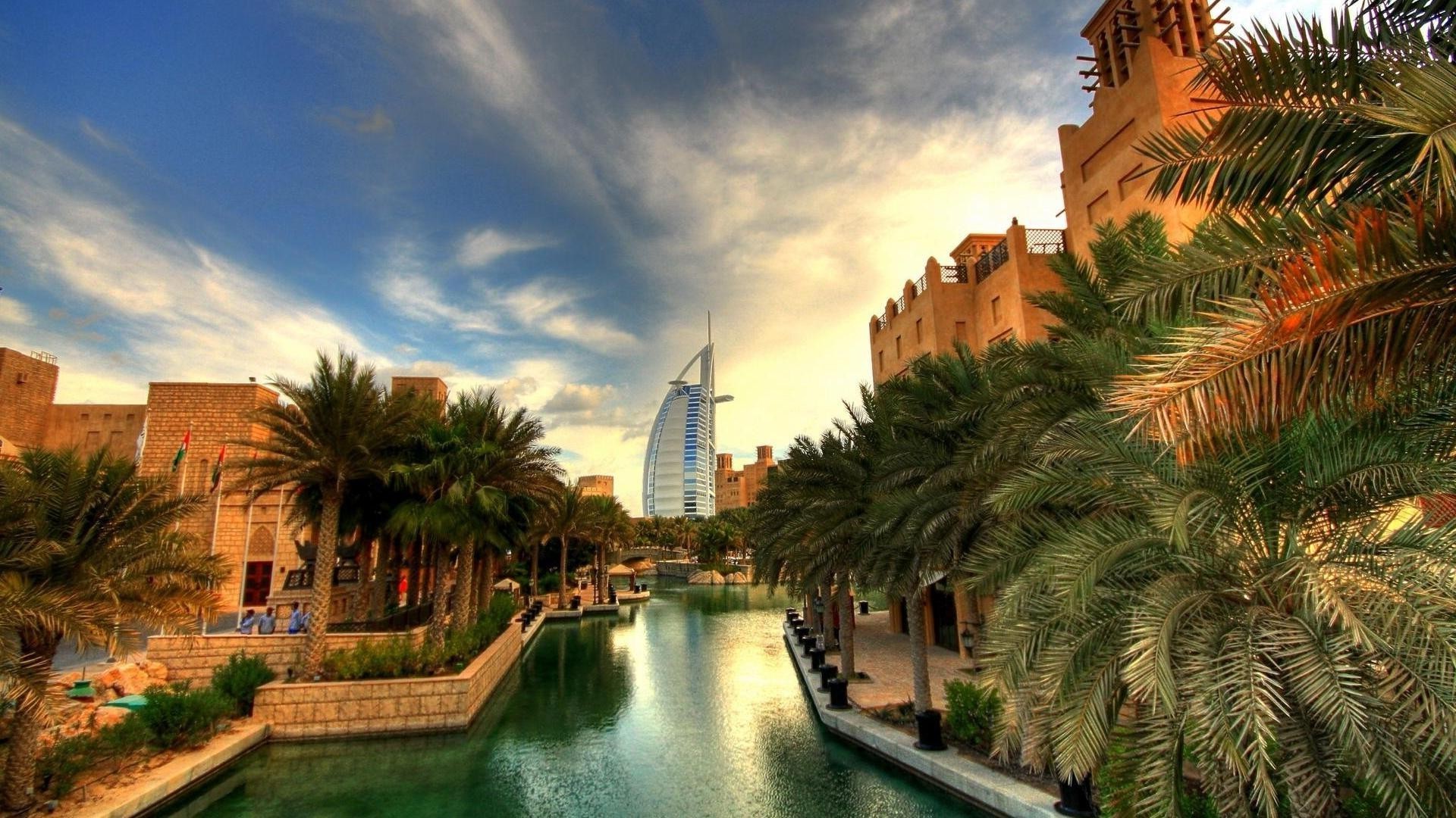 city and architecture architecture travel water hotel outdoors building tree palm sky city vacation resort sunset