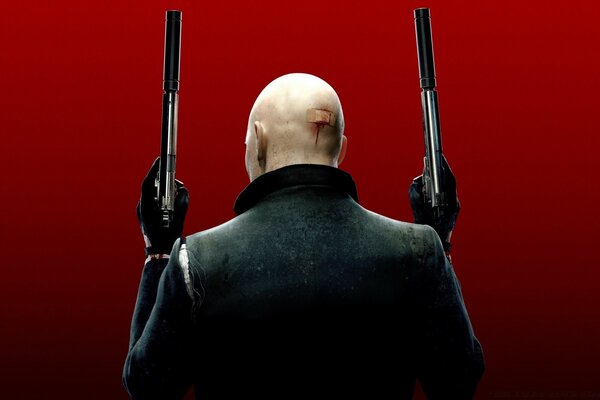 Hitman standing with his back with two pistols