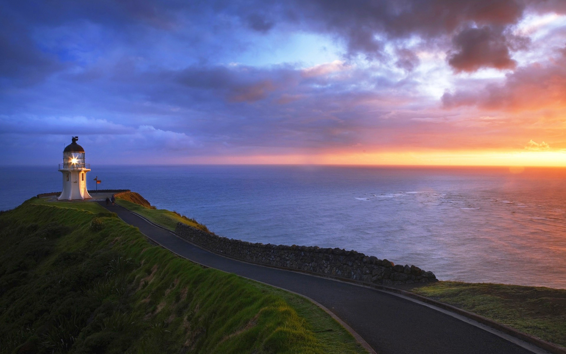 carretera puesta del sol agua faro mar paisaje playa mar océano cielo viajes amanecer naturaleza noche anochecer al aire libre paisaje luz sol verano