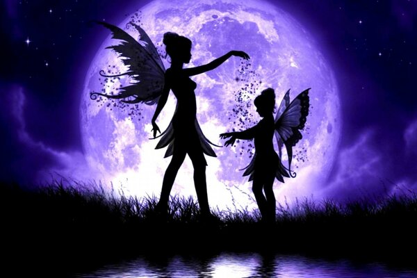 Silhouettes of two fairies in the moonlight