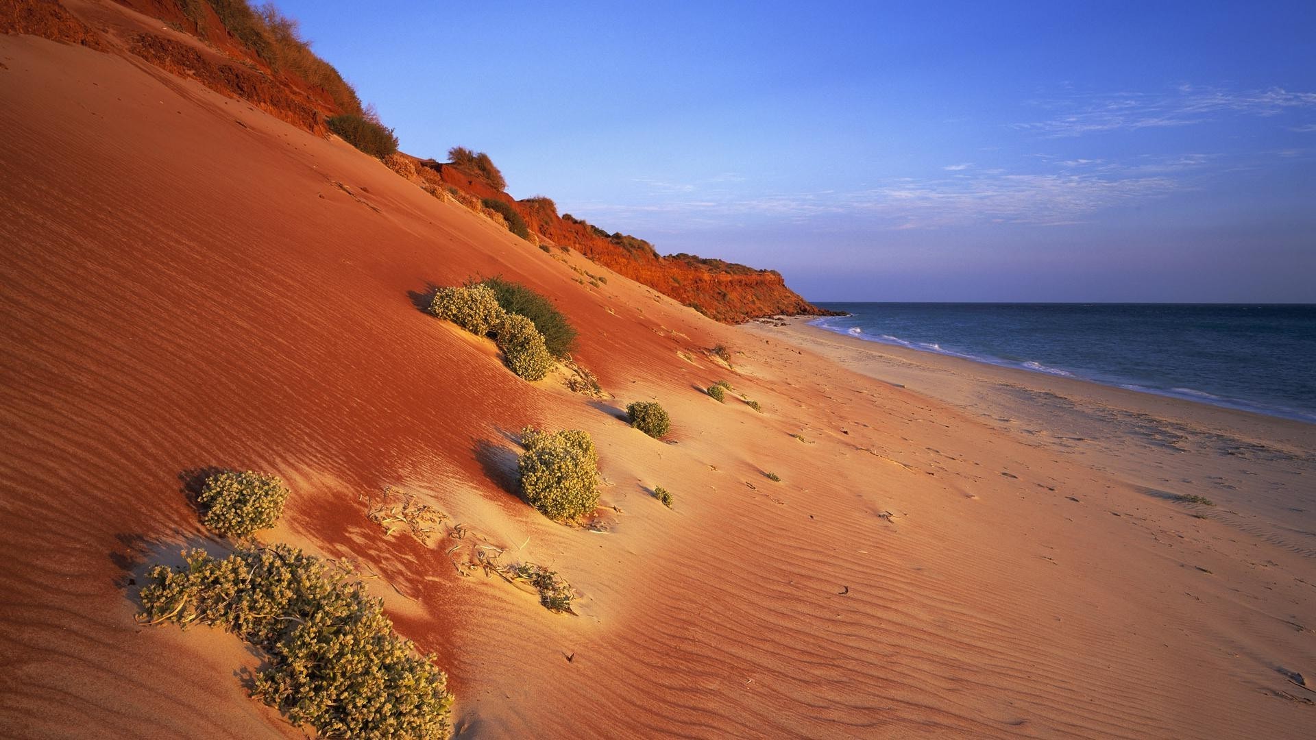 sea and ocean sand water beach travel seashore sunset sea ocean outdoors nature sun surf sky