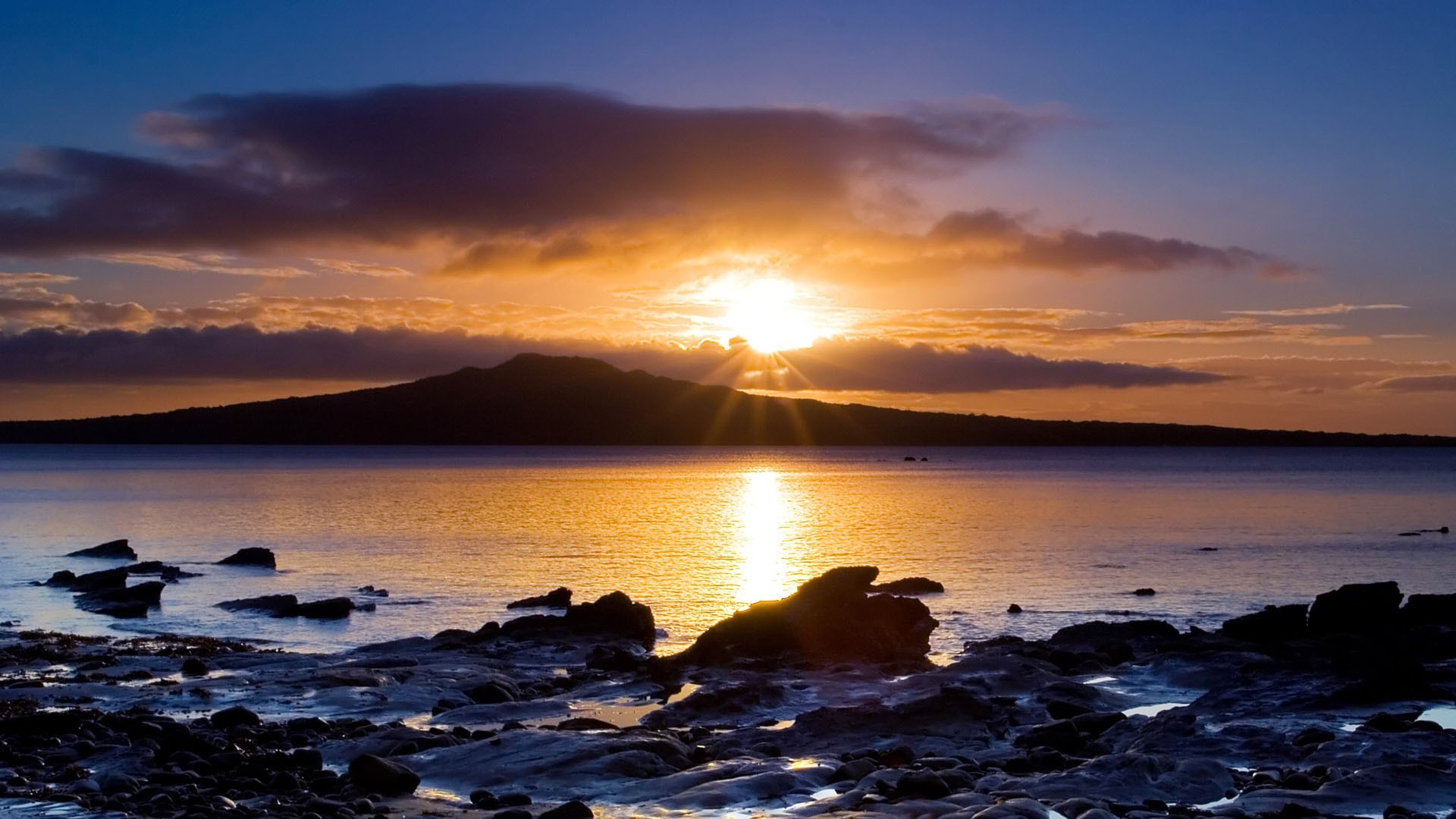 islands sunset water dawn dusk evening sea ocean sun beach sky travel seashore reflection fair weather seascape