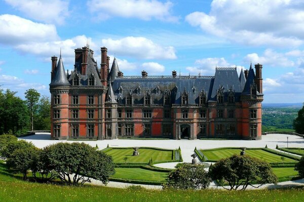 An old castle with a well-kept park