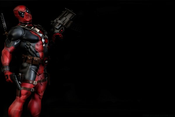 Deadpool on a black background with a gun