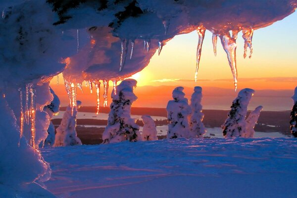 Sparkling stalactites in the rays of the sun