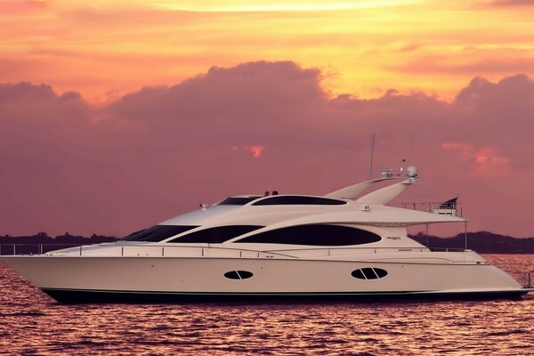 Yacht on the background of a beautiful sunset