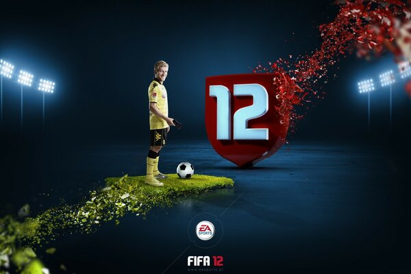 Joueur de football avec un ballon de FIFA 12 sur l îlot