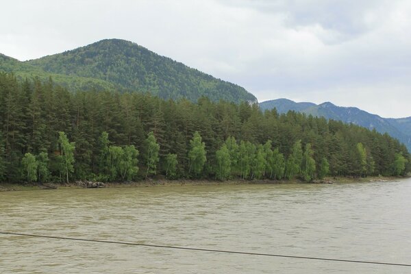 Landscape of spring. Mountains and water