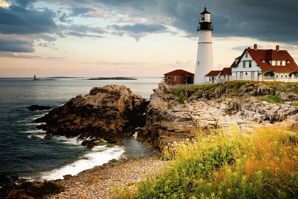 Lighthouse on the seashore. Landscape