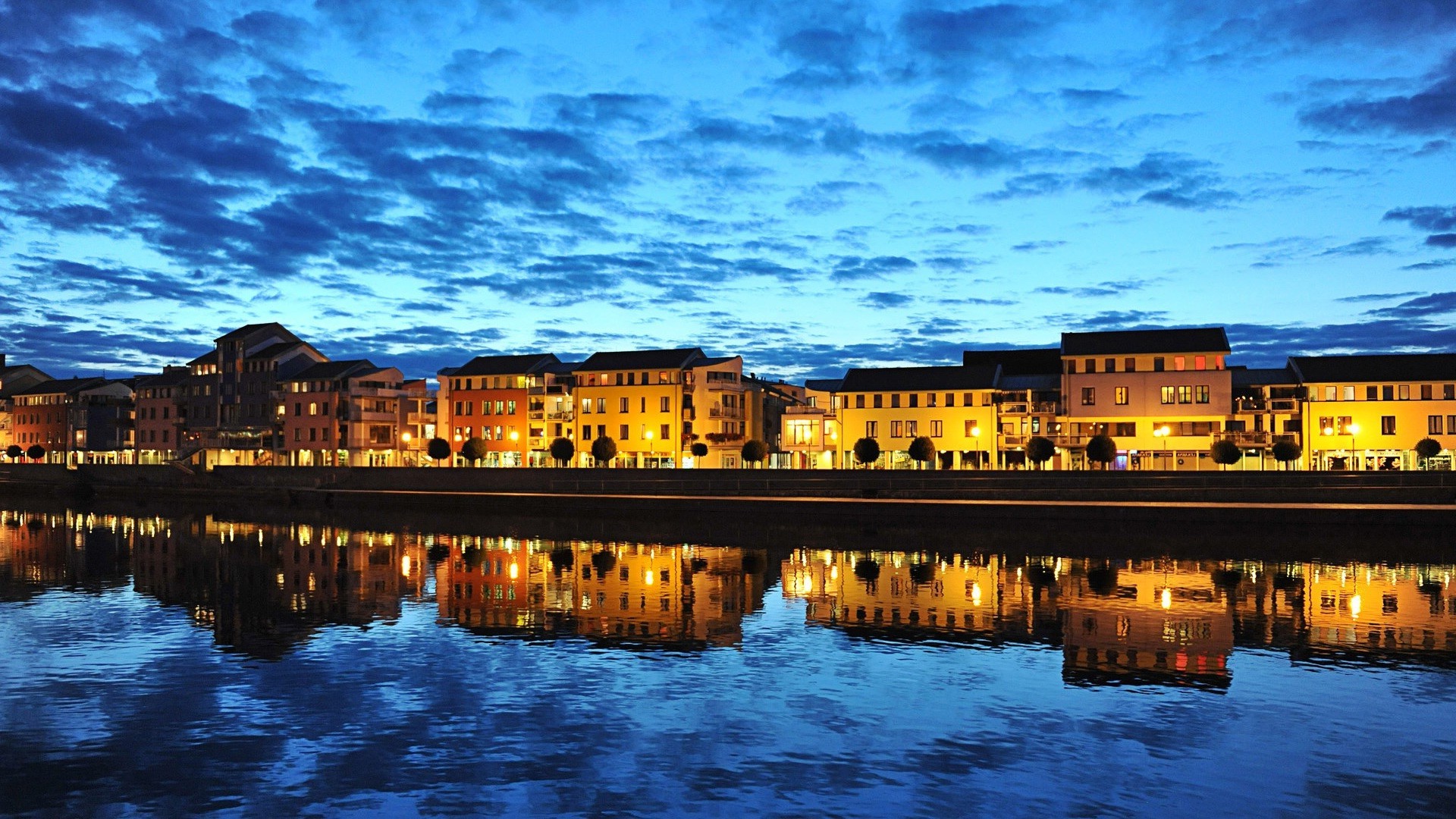 city water sunset travel architecture dusk evening river reflection building sky outdoors dawn bridge