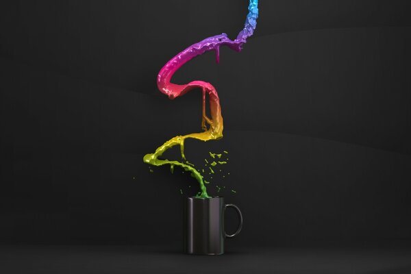 L eau colorée jaillit d une tasse noire