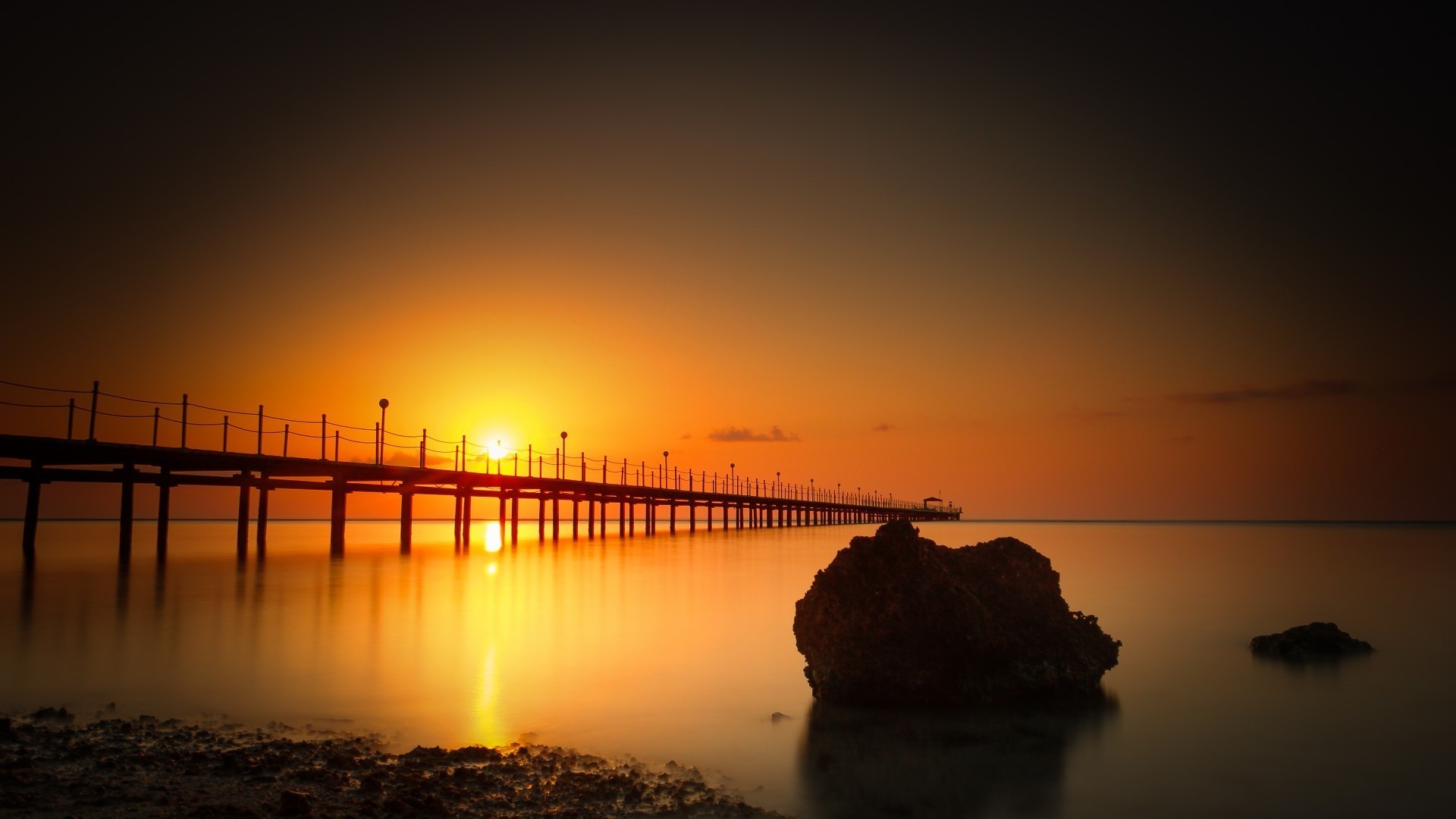 atardecer y amanecer atardecer amanecer agua mar playa sol océano noche crepúsculo reflexión puente paisaje cielo muelle silueta luz paisaje lago