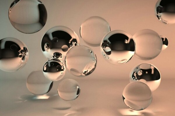 Liquid bubbles on a gray-beige background