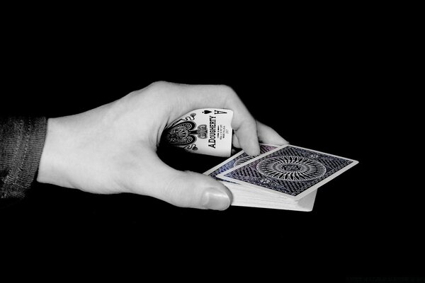 A deck of cards on a black background