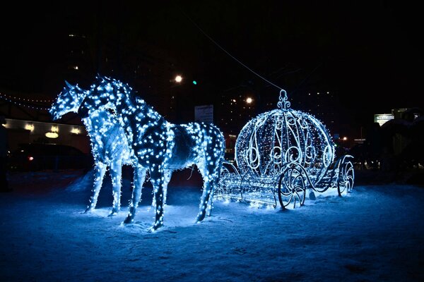 Silvesterwagen mit Pferden im Schnee