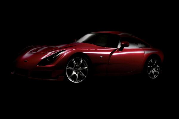 Red sports car in the dark