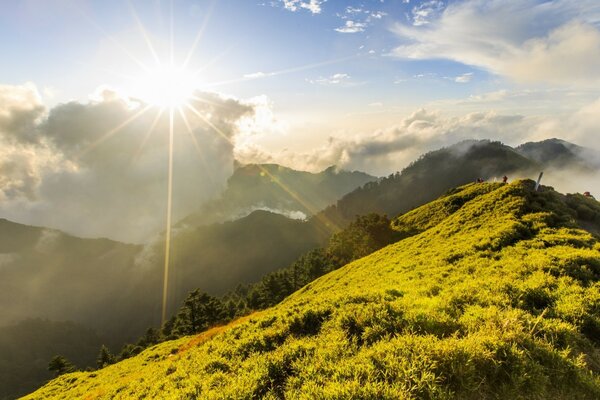 Sunlight on green hills