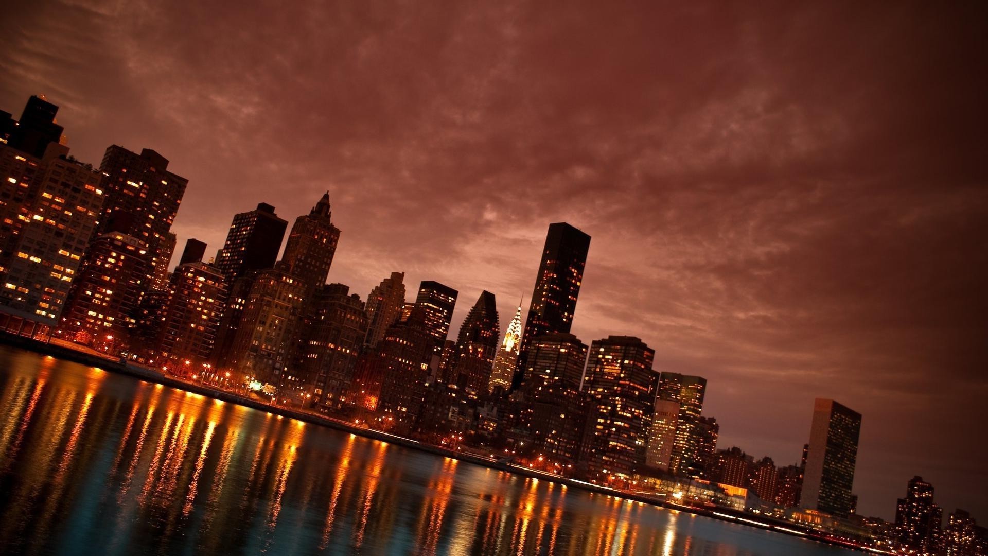 skyscrapers city architecture downtown skyline cityscape skyscraper dusk evening sunset travel building sky street bridge urban reflection river light tower