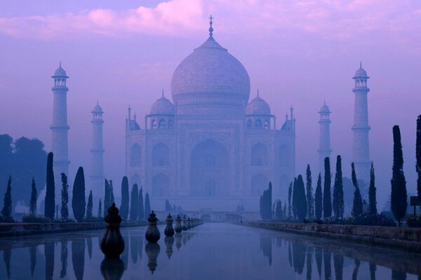 The minaret surrounded by fog is mysterious