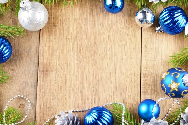 Floor with spruce branches and Christmas tree toys