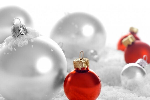 Red and silver balls on a white background