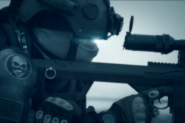 A sniper looking into the sight of his trusty weapon