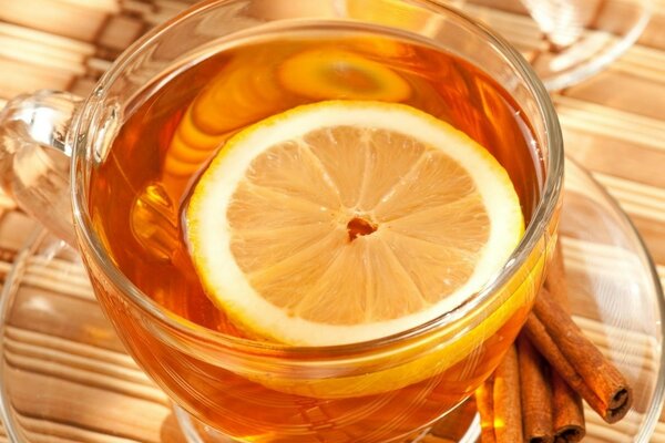 Delicious golden tea with lemon