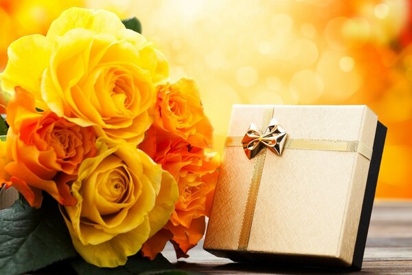 Beautiful flowers with a birthday gift