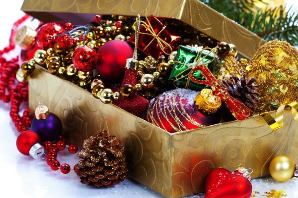 A box filled with different Christmas toys