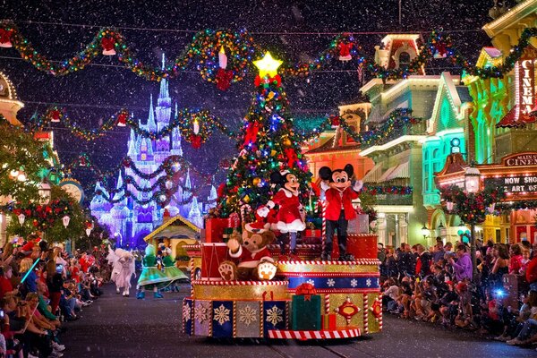 Christmas festival. Mickey Mouse on stage