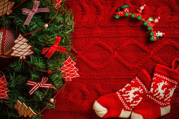 Christmas socks on a red sweater