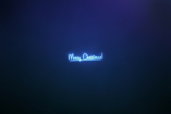 The inscription Merry Christmas on a blue background