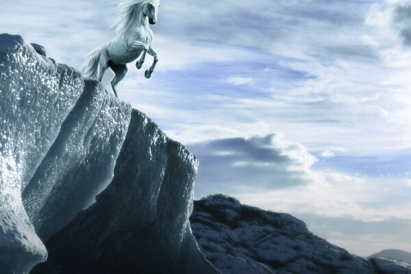 A horse on the outskirts of an icy mountain