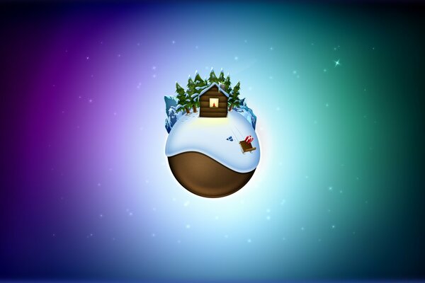 Christmas ball with a house on the desktop