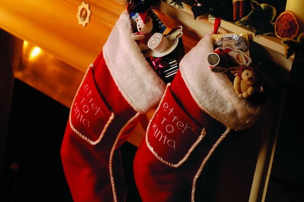 Socks over the fireplace full of gifts