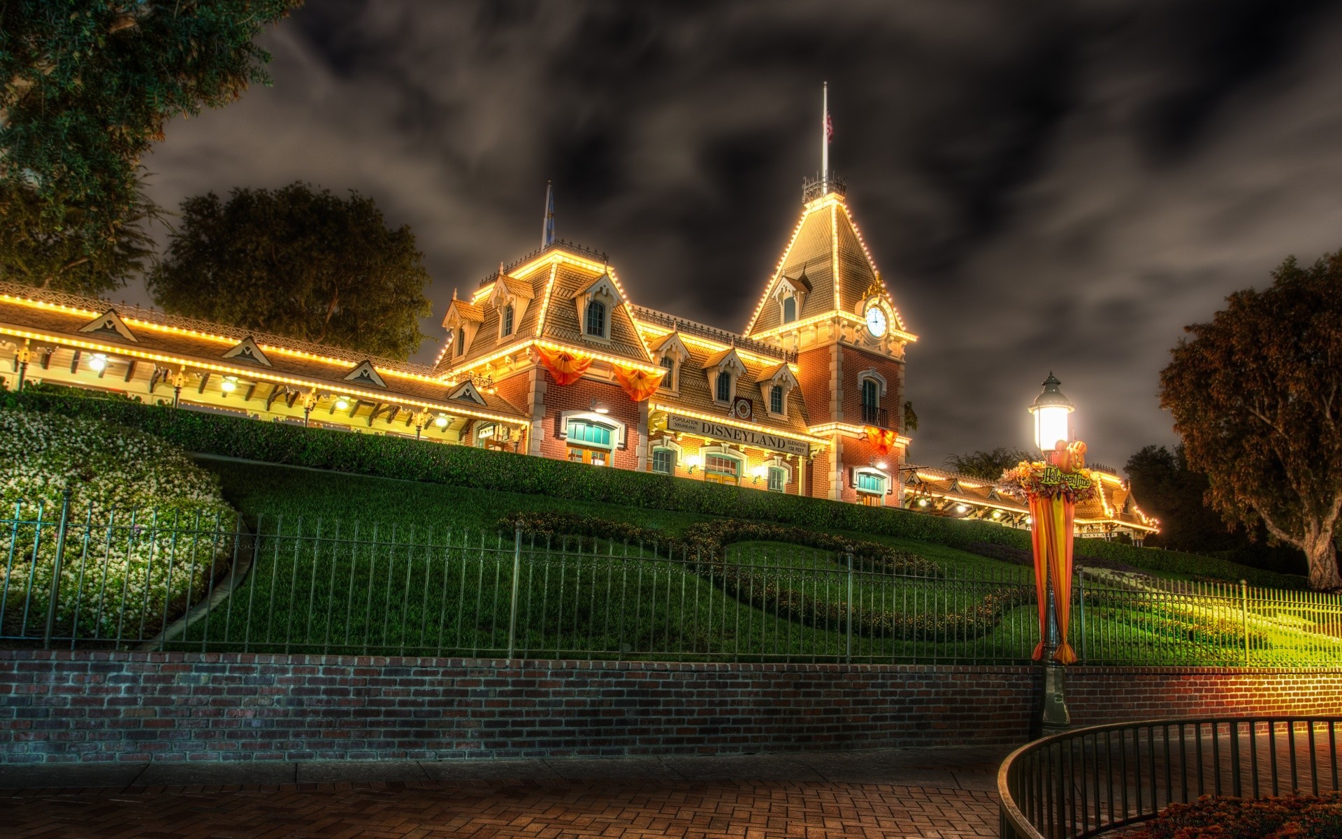 halloween travel architecture evening building city light dusk park outdoors sky sunset castle tree water