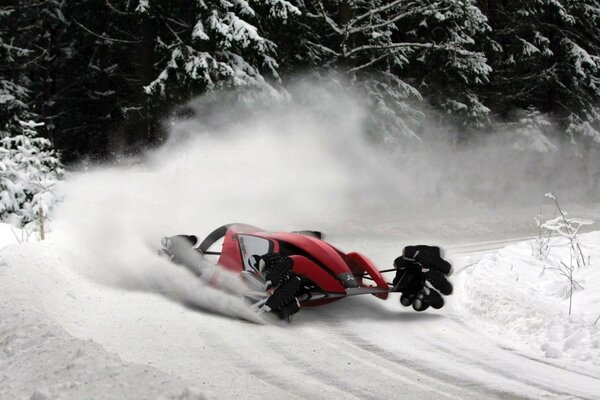 Racing car on a turn in the snow