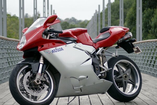 A sports bike stands on the bridge