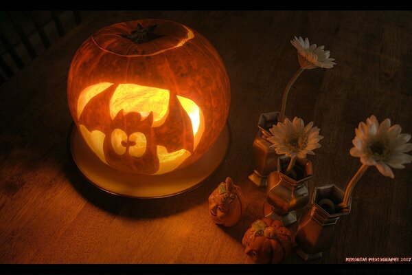 Pumpkin with a bat and a lantern