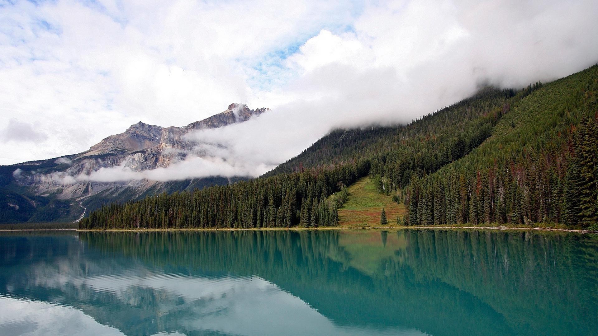 lake water mountain landscape snow travel nature outdoors sky wood dawn fog scenic