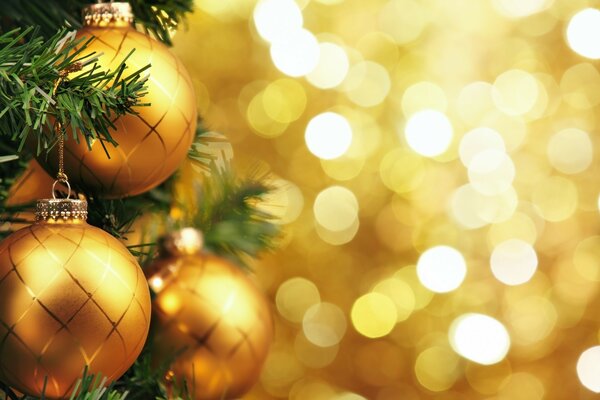 Festive atmosphere and golden balls on the Christmas tree