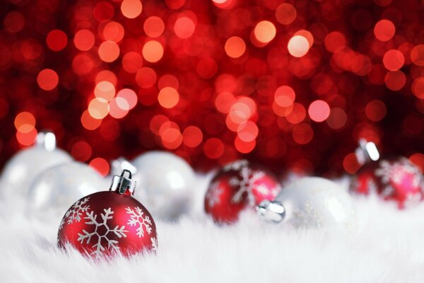 Red Christmas balls in the snow