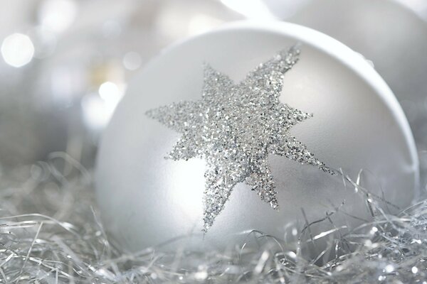 New Year s white ball with a snowflake