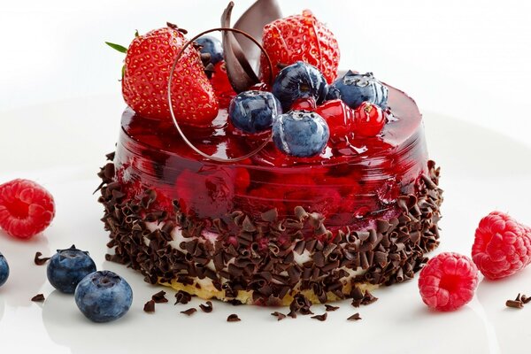 Dessert with jelly and chocolate, decorated with berries