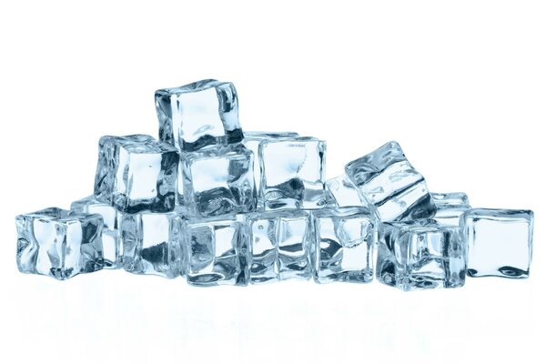 A pile of ice cubes on a white background