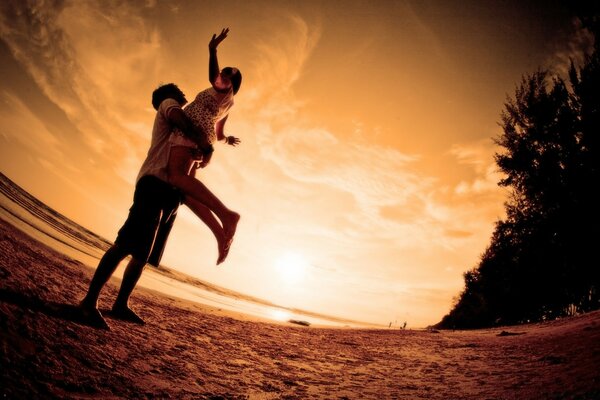 Silhouette of lovers on a backlit background