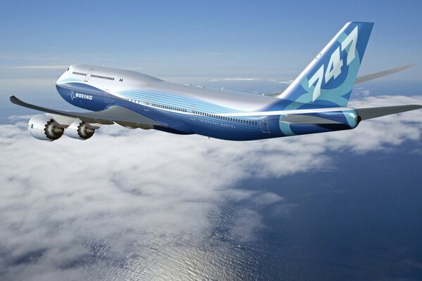 A plane hovering in the air over the sea