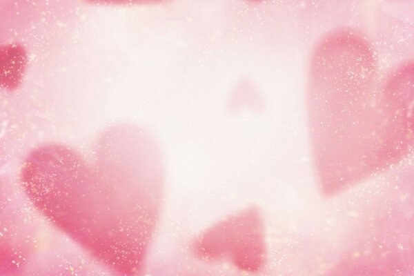 Abstract image of hearts in pink mist