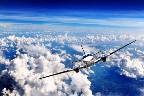 A plane taking off flies to meet the wind