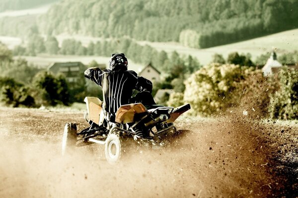 Quad bike racing on the ground